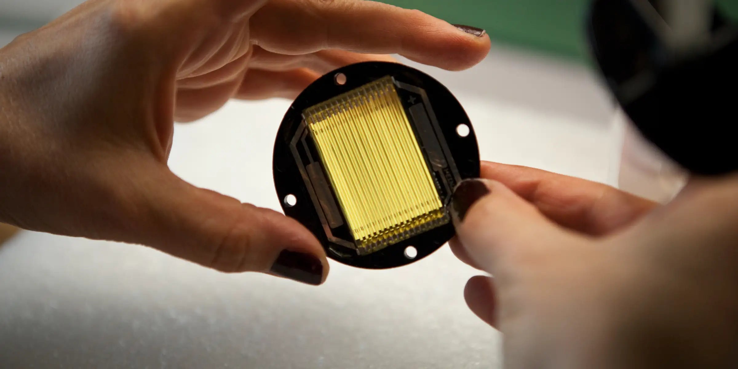 A close up shot of a HEDD Air Motion Transformer driver being assembled by hand