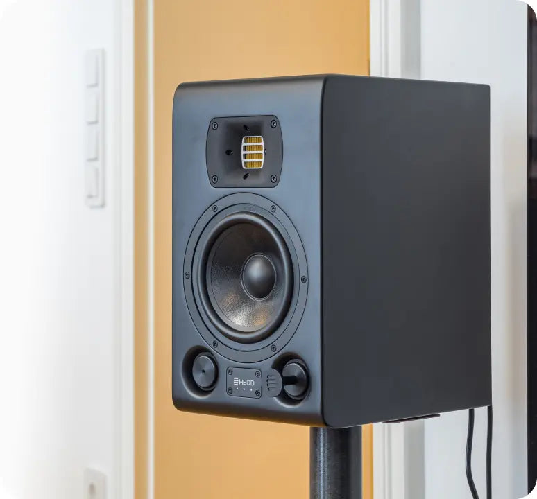 A HEDD speaker on a stand in a home