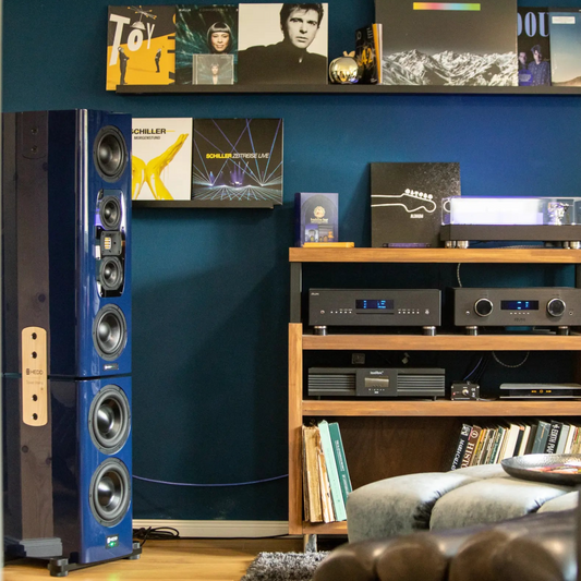 A photo of a custom blue HEDD Tower Mains unit in a living room