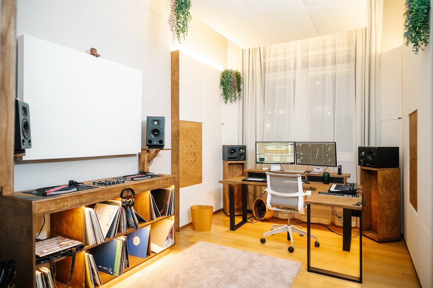 Modern home studio with HEDD MK2 monitors and HEDD CTRL software on a computer