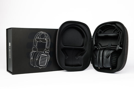 HEDDphone TWO in a protective case with packaging on a white background