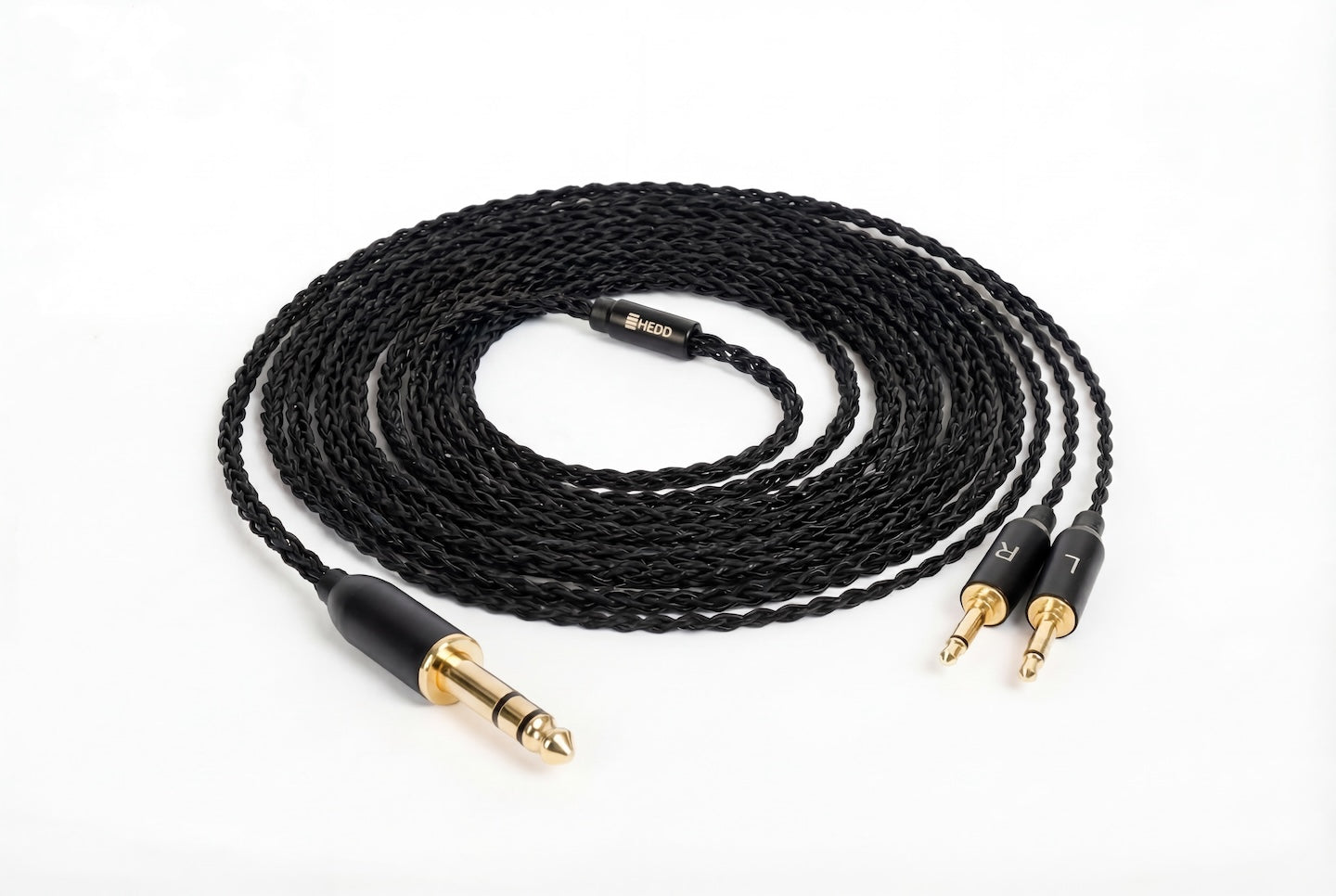 Unbalanced audio cable for the HEDDphone TWO with gold connectors on a white background