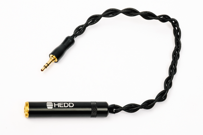 Unbalanced audio adapter for the HEDDphone TWO GT on a white background
