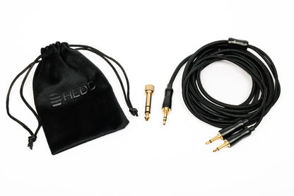 HEDDphone D1 cable set with black drawstring bag on a white background