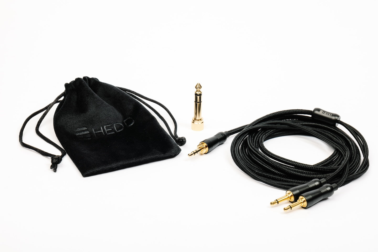 HEDDphone D1 audio cable set with connectors and a branded pouch on a white background