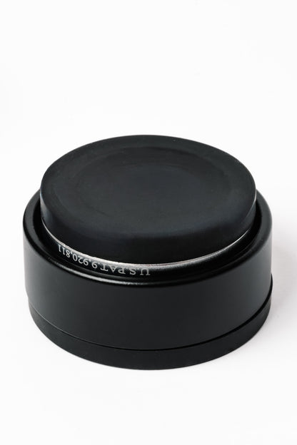 HEDD branded mini ISOPuck on a white background