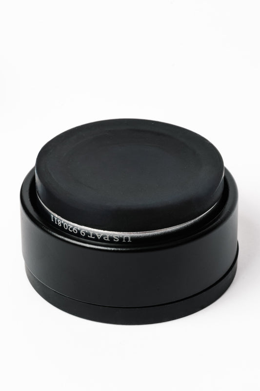HEDD branded mini ISOPuck on a white background
