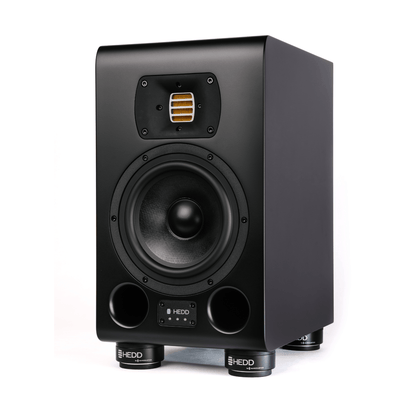 HEDD TYPE 07 ACORE monitor speaker on a white background with mini ISO pucks for isolation