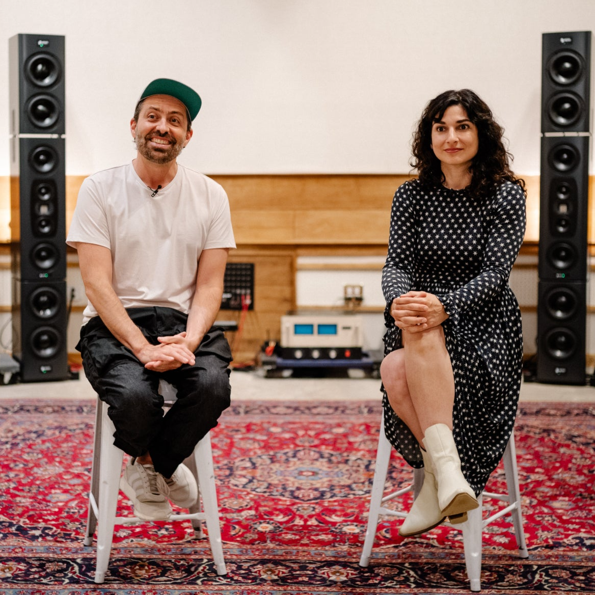 The owners of the Bridge studio in NYC sitting in their main room