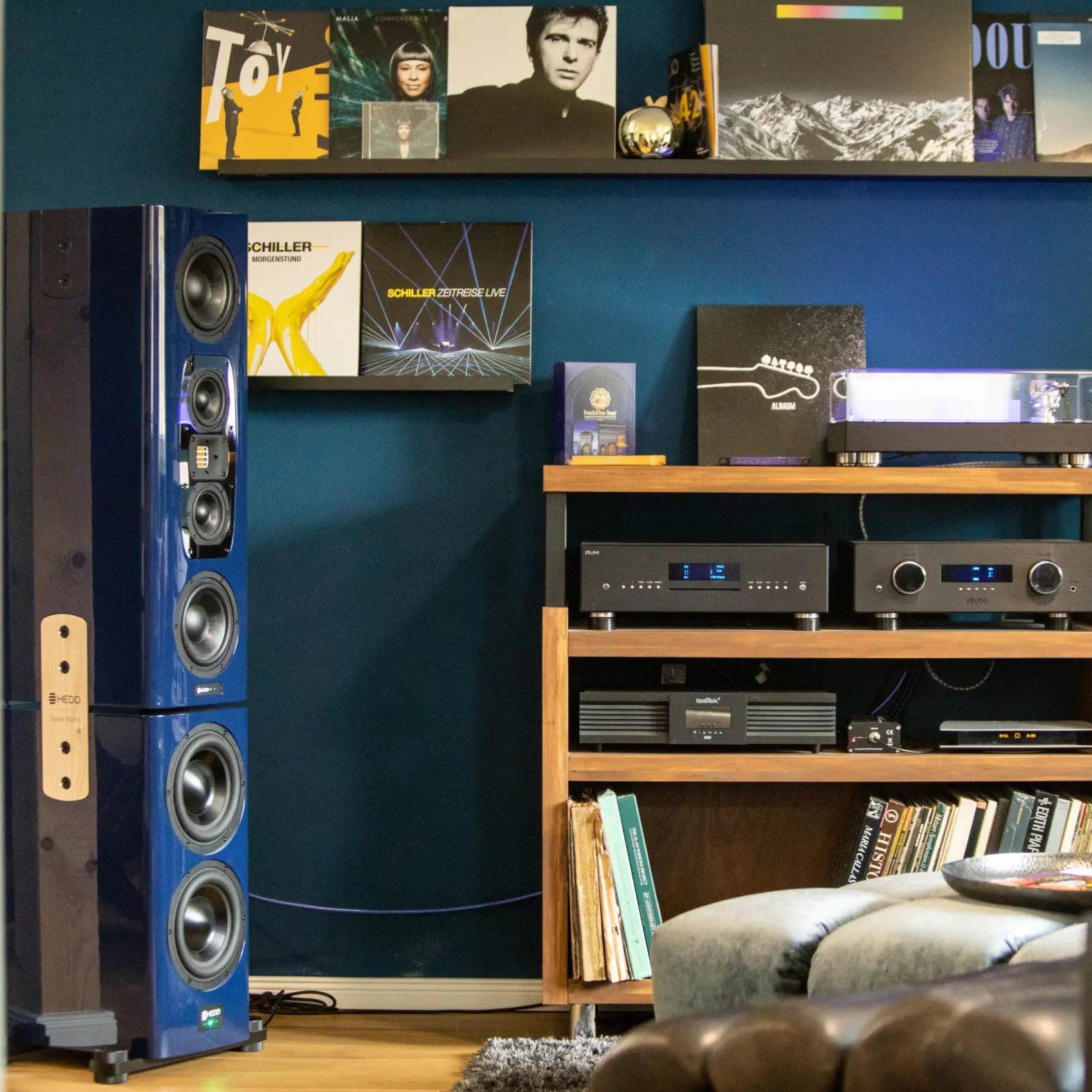 A photo of a custom blue HEDD Tower Mains unit in a living room 