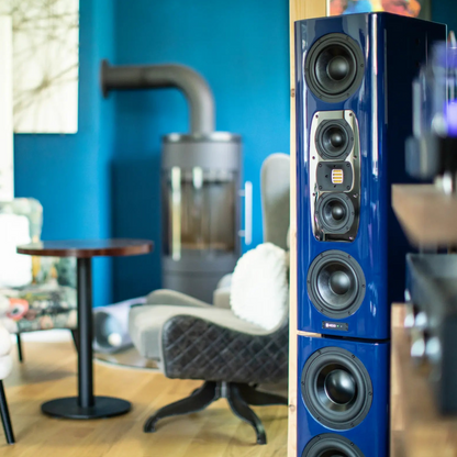 A photo of a custom blue HEDD Tower Mains unit in a living room 